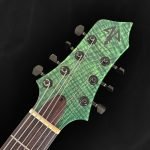 Guitare électrique flying V en bois vert et incrustations personnalisées